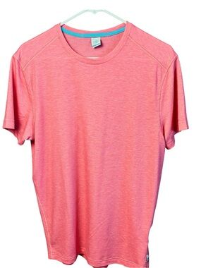 Men's performance moisture wicking REV short sleeve tee size medium. NWOT